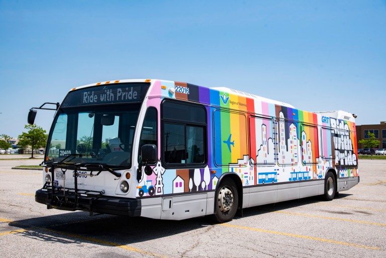 A transit bus with Pride colours