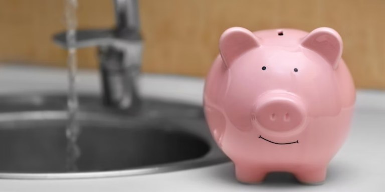Piggy bank and running faucet.