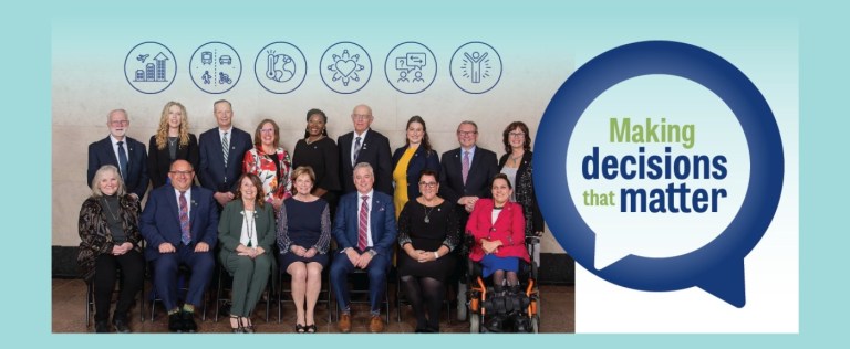 Regional Council members sitting on chairs, with text "Making Decisions That Matter."