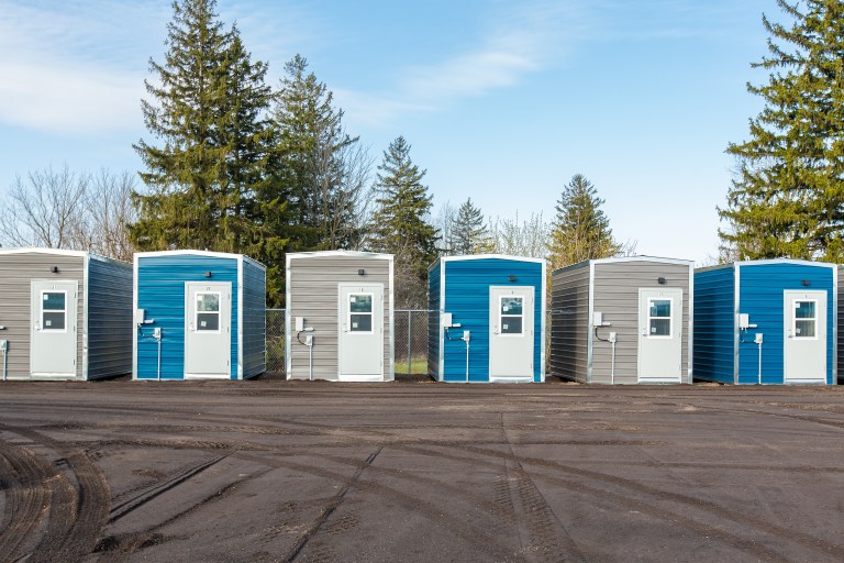 A row of small cabins at the Region of Waterloo's new outdoor shelter.