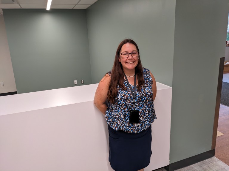 Employee stands inside the newly-renovated 20 Weber Street that will become a Welcome Space for the Region of Waterloo.