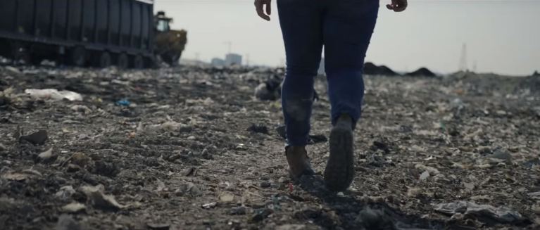 Someone walking through the Region of Waterloo's landfill.
