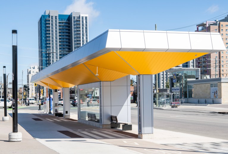 A new yellow and silver transit shelter at King and University in Waterloo.