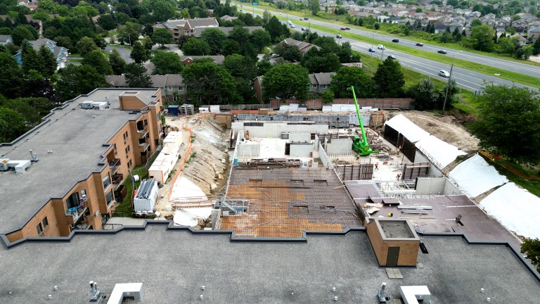 Aerial view of a rental housing complex under construction.