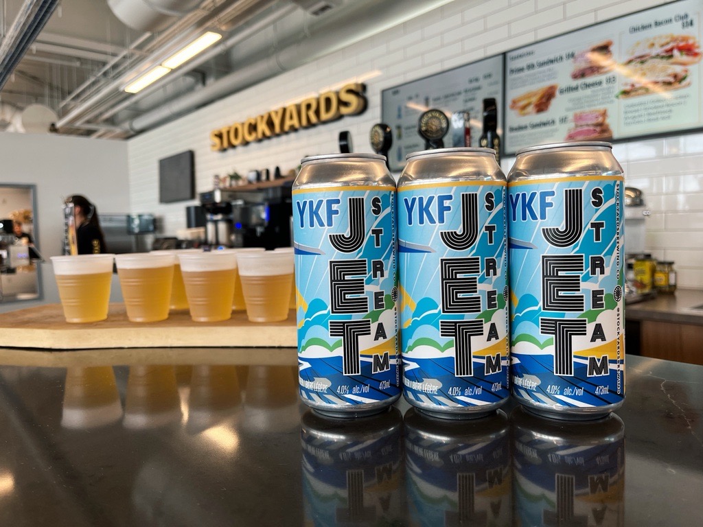 Cans of the "Jet Fuel" lager, created by the new Stockyards restaurant, located inside YKF airport.