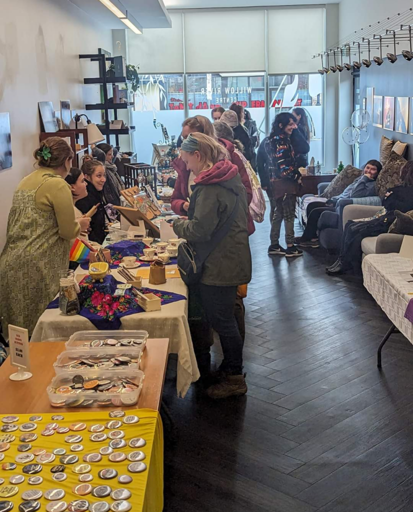 People gathered inside the Willow River Centre.