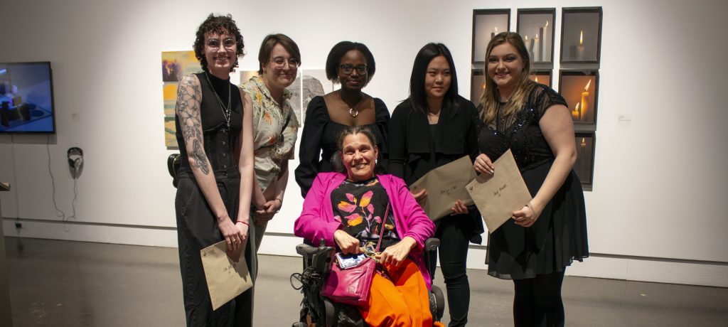 Regional Councillor Chantal Huinink announces the winners of the UW Fine Arts Partnership in March 21, 2024. The selected artists are: (L to R) Echo Vettoretto, Ro Miles, Deborah Odia, Jee-In Lee, and Ariel Rossiter.