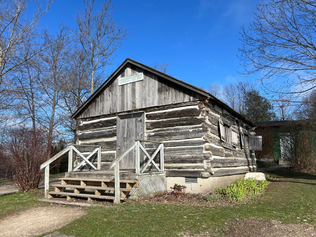 Exterior of the rustic 1820 Log House in Waterloo Park.