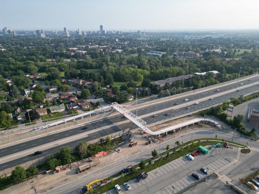 An overhead photo of a new pedestrian bridge installed over Highway 7/8 in Kitchener.