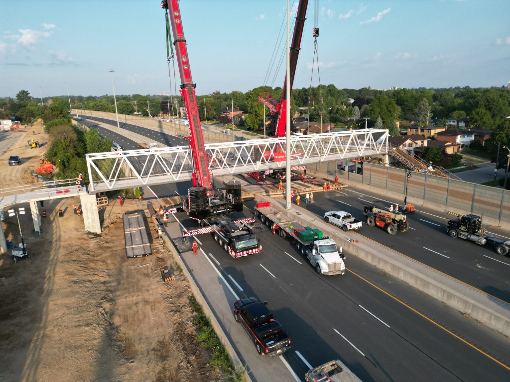An overhead photo of a new pedestrian bridge installed over Highway 7/8 in Kitchener.