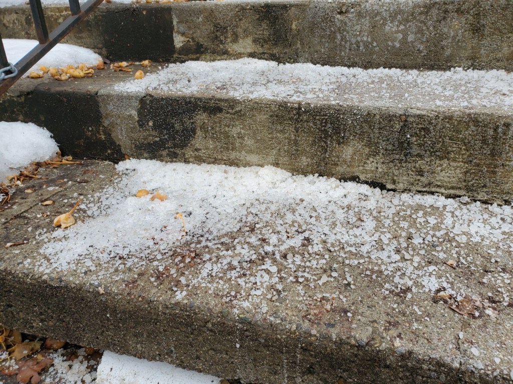 Cement stairs covered with clumps of salt.
