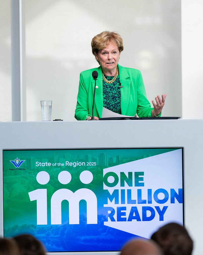 Regional Chair Karen Redman delivers her speech from a podium during the 2025 State of the Region event.