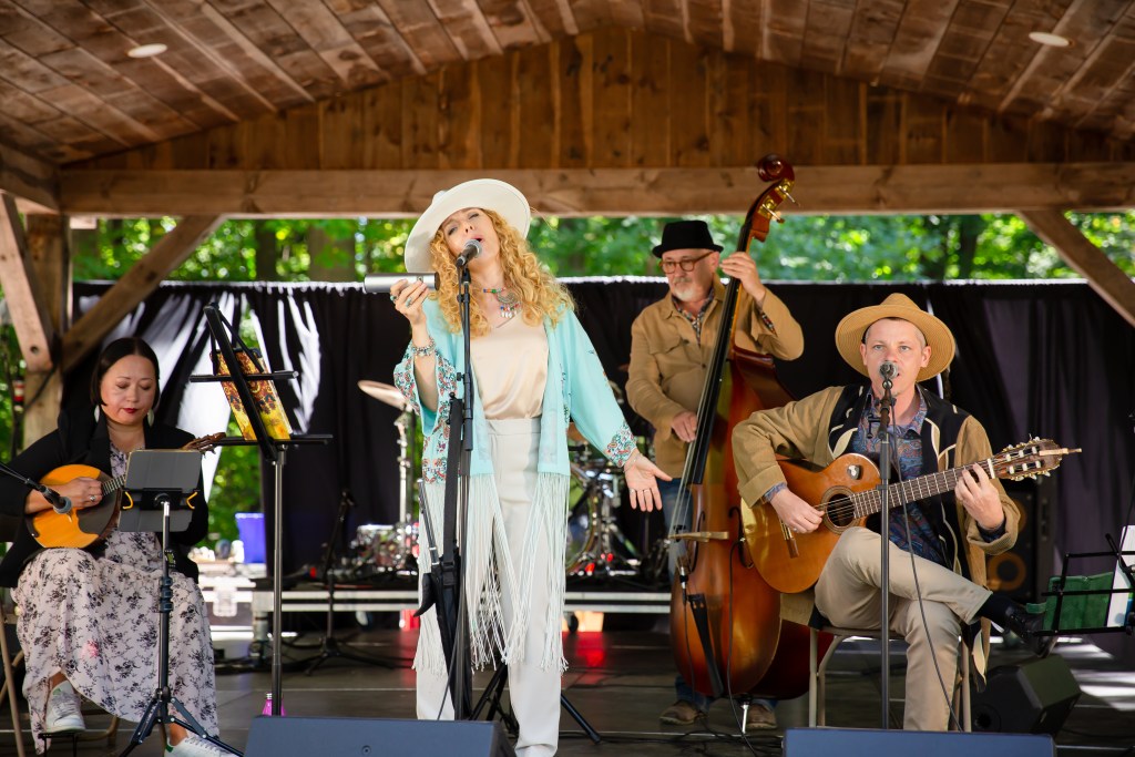 Performers on stage during the 2025 HOPE Multicultural Festival of Elmira.