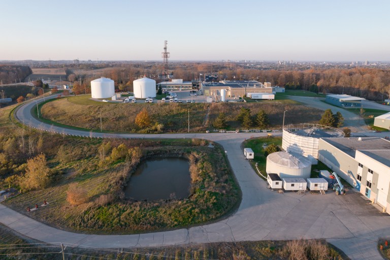 Aerial view of the various buildings and water storage tanks at the Mannheim Water Treatment Plant.